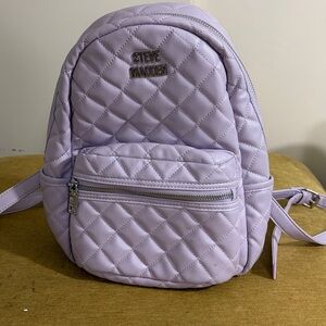 Steve Madden small quilted backpack in a light purple color
